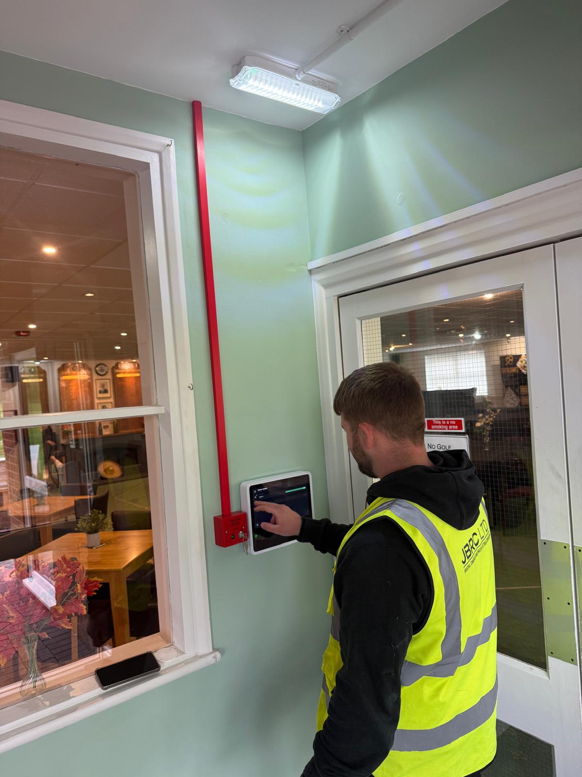 Commercial fire alarm panel and addressable detectors installed in a Nottingham office